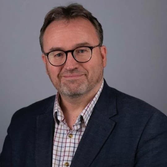Headshot of Darren Hargrave.
