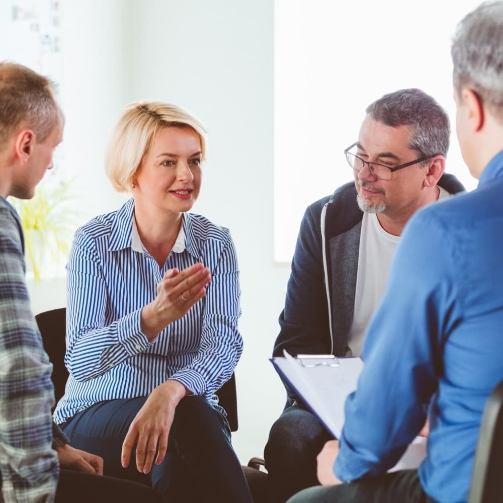 Several people sat in discussion.