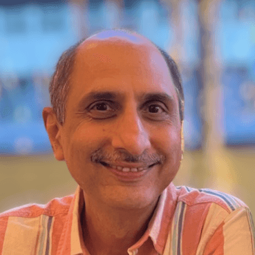 Headshot of Milind Ronghe.